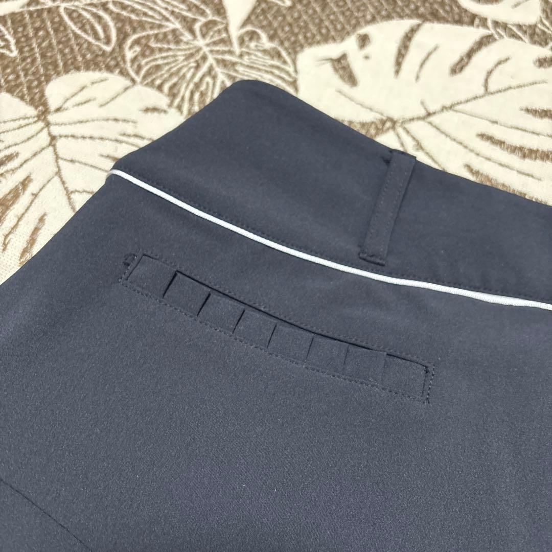 【デサントゴルフ】LUXEコレクション　裾ロゴ変形フレアスカート　インナー付　M
