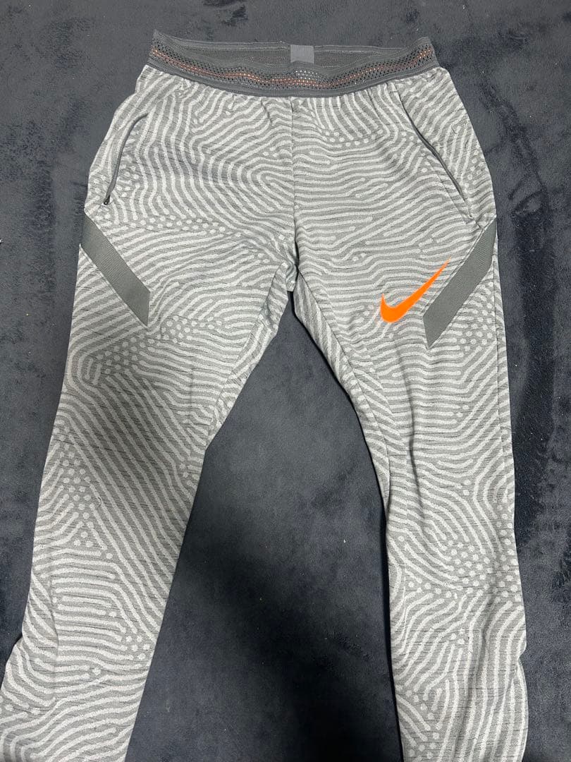 Nike ドリルトップ上下ウェア グレー/オレンジ