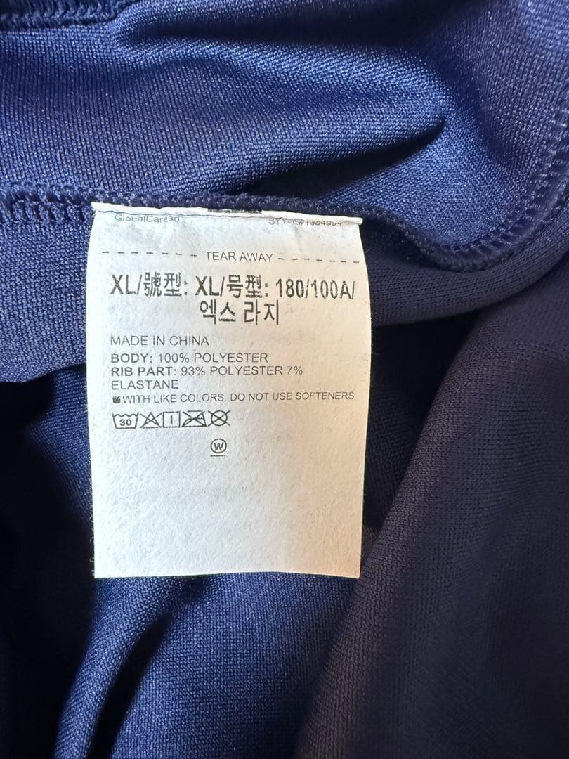 新品タグ付UNDERARMOURサイドラインジャケットXLネイビーUNISEX