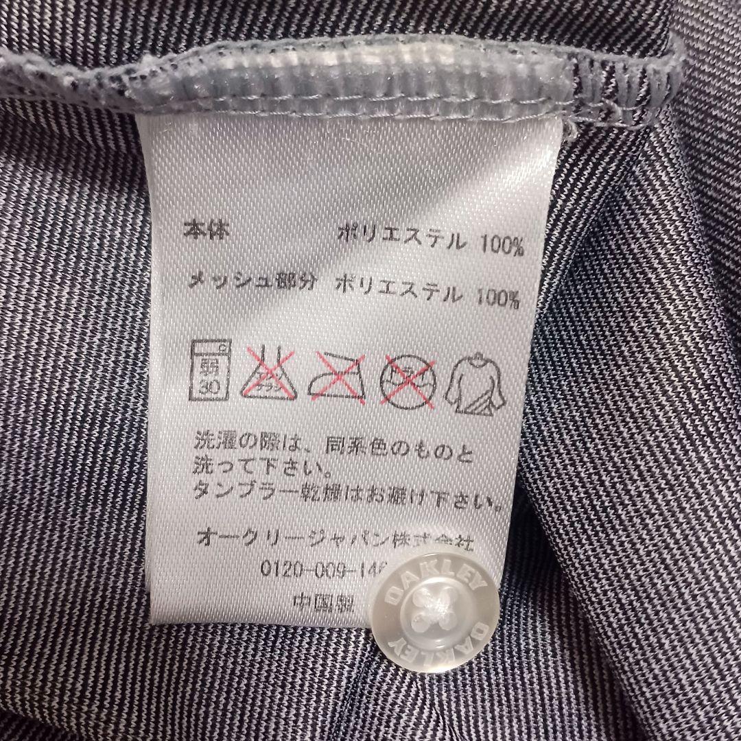 オークリーゴルフ　メンズ　半袖ポロシャツ　ホワイト系　L　総柄　スカル