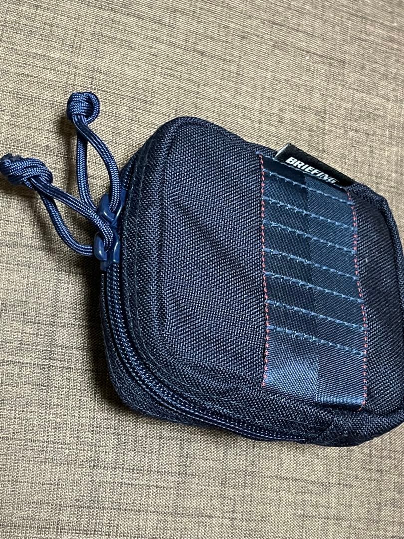 BRIEFING MINI ROUND POUCH (ボールケース)