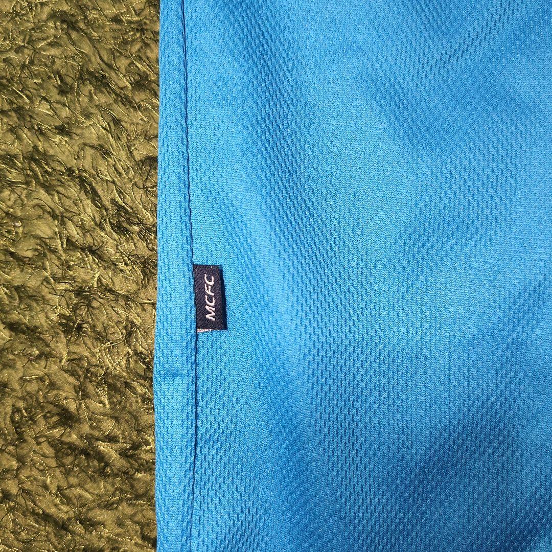 マンチェスターシティ　le coq sportif