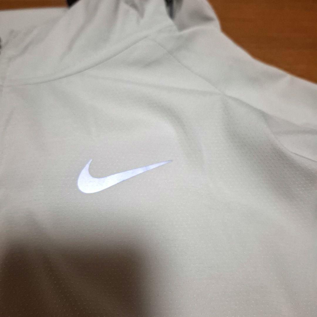 Nike ウィンドラ ンナー　レペル ランニングジャケッ　L ポケッ ト収納式