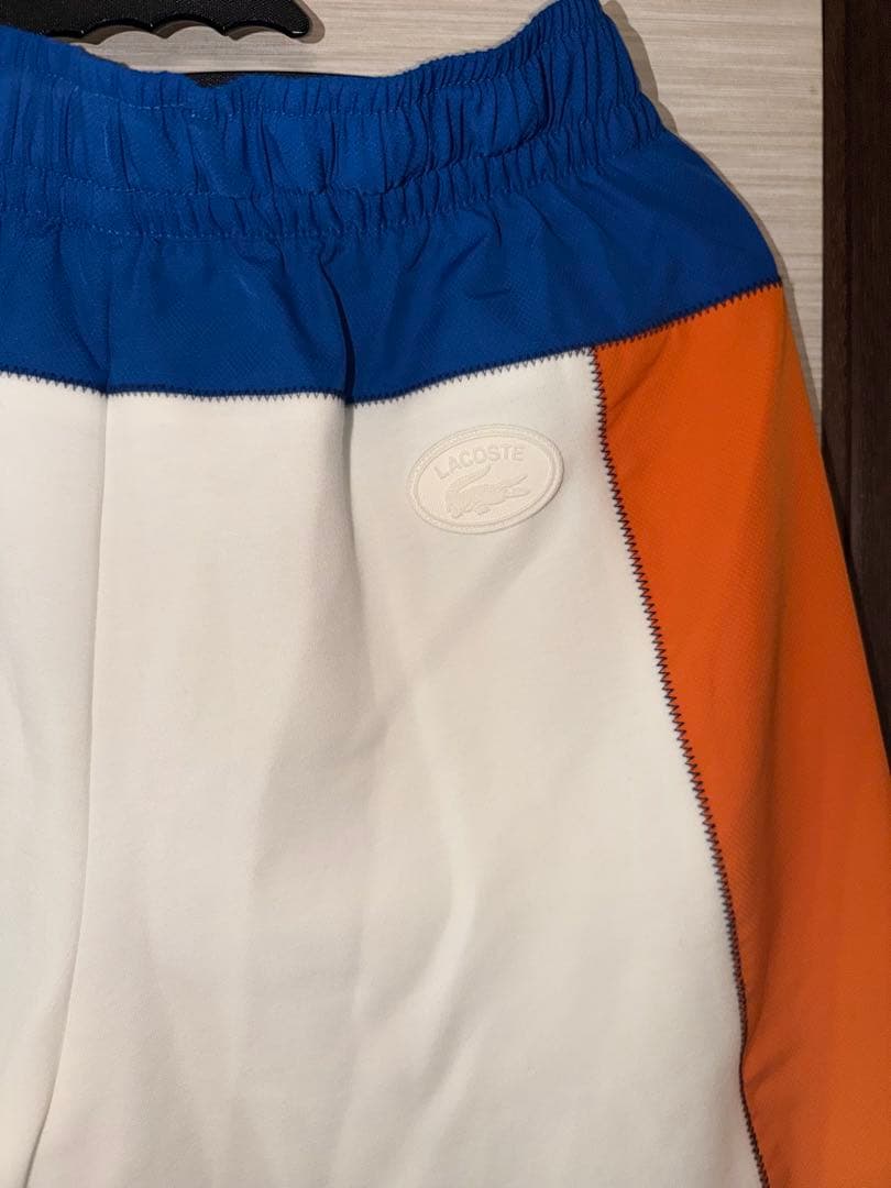 LACOSTE ジャージパンツ ホワイト/オレンジ/ブルー