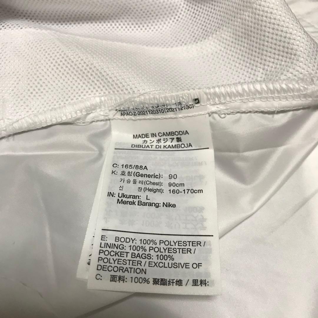 レディース　NIKE ウィンドブレーカー　ピンク