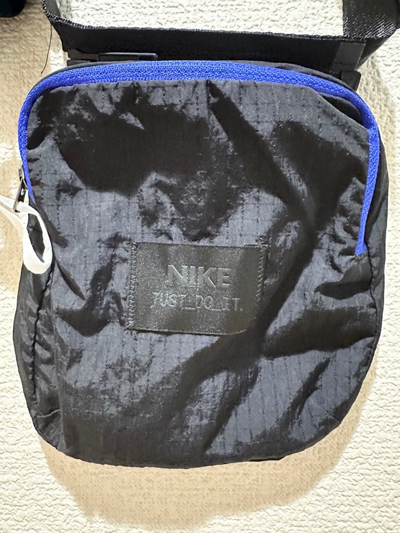 NIKE ウィンドブレーカー フード有り 黒 XL ポーチ付 新品