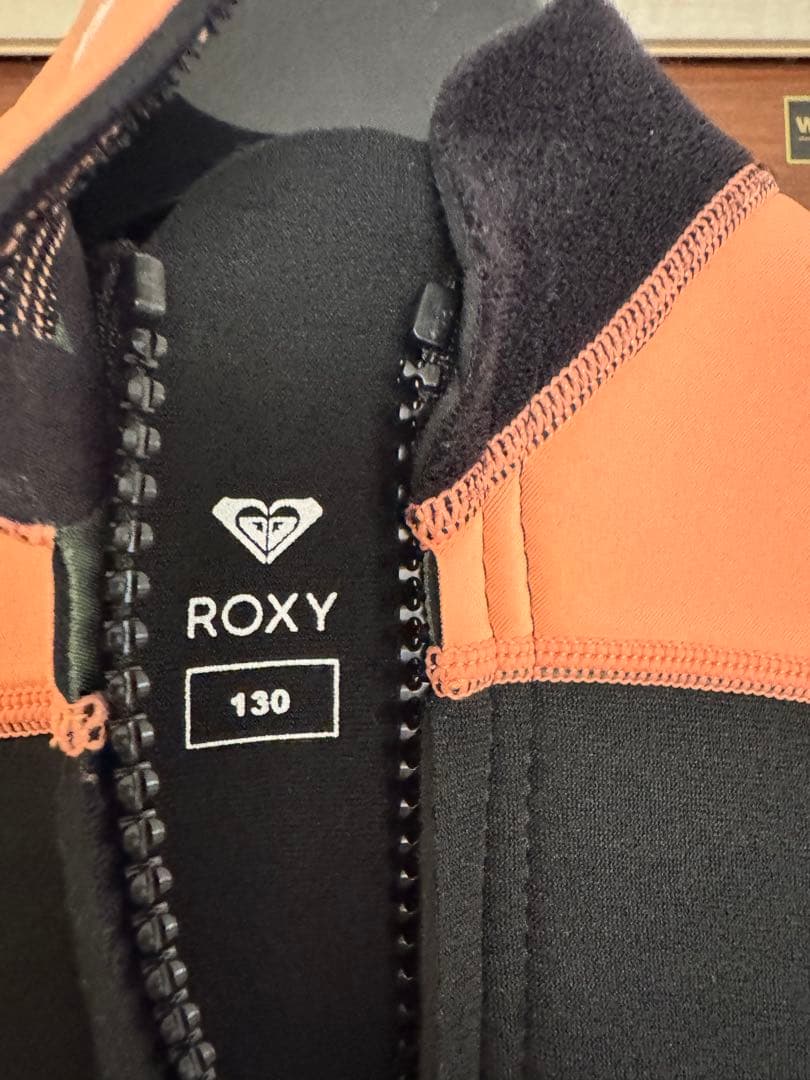 カオ　ROXY フルスーツ 130サイズ オレンジ　ピンク