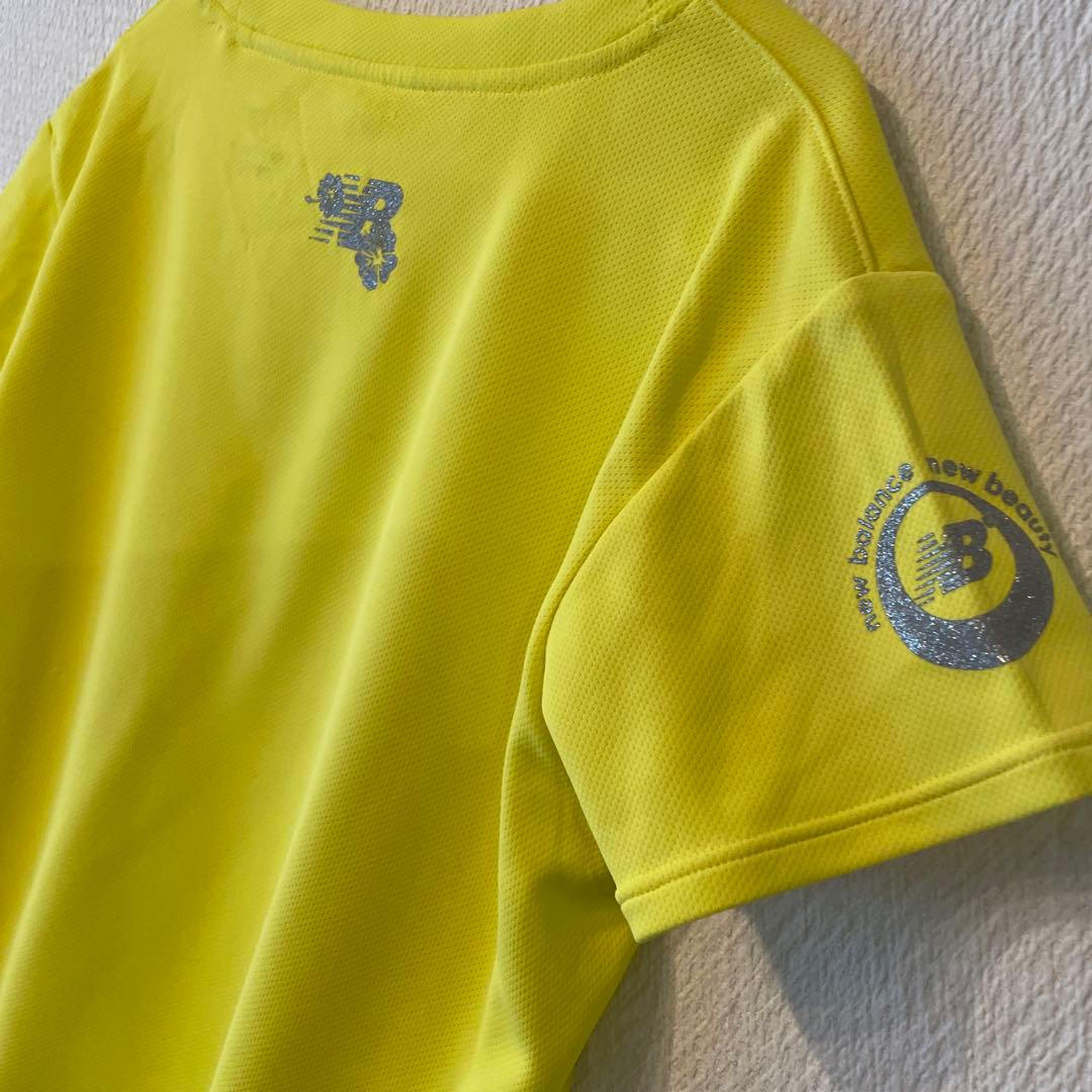 ホノルルマラソン限定　ハイビスカスnew balance イエロー トップス