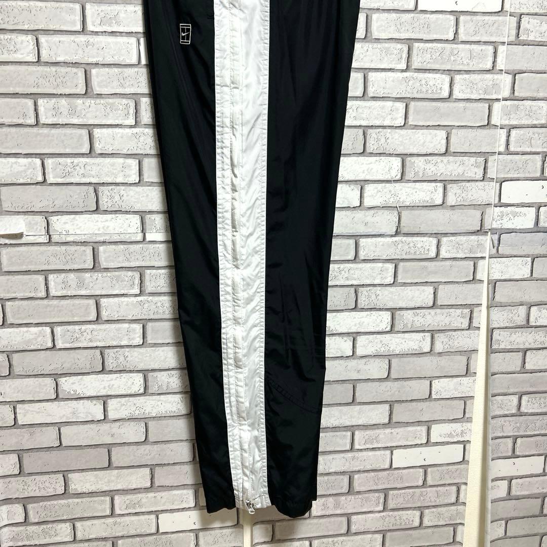 セール《美品》NIKE☆ナイキ☆ナイロンジャージ 刺繍ロゴ 側面チャック 黒/白