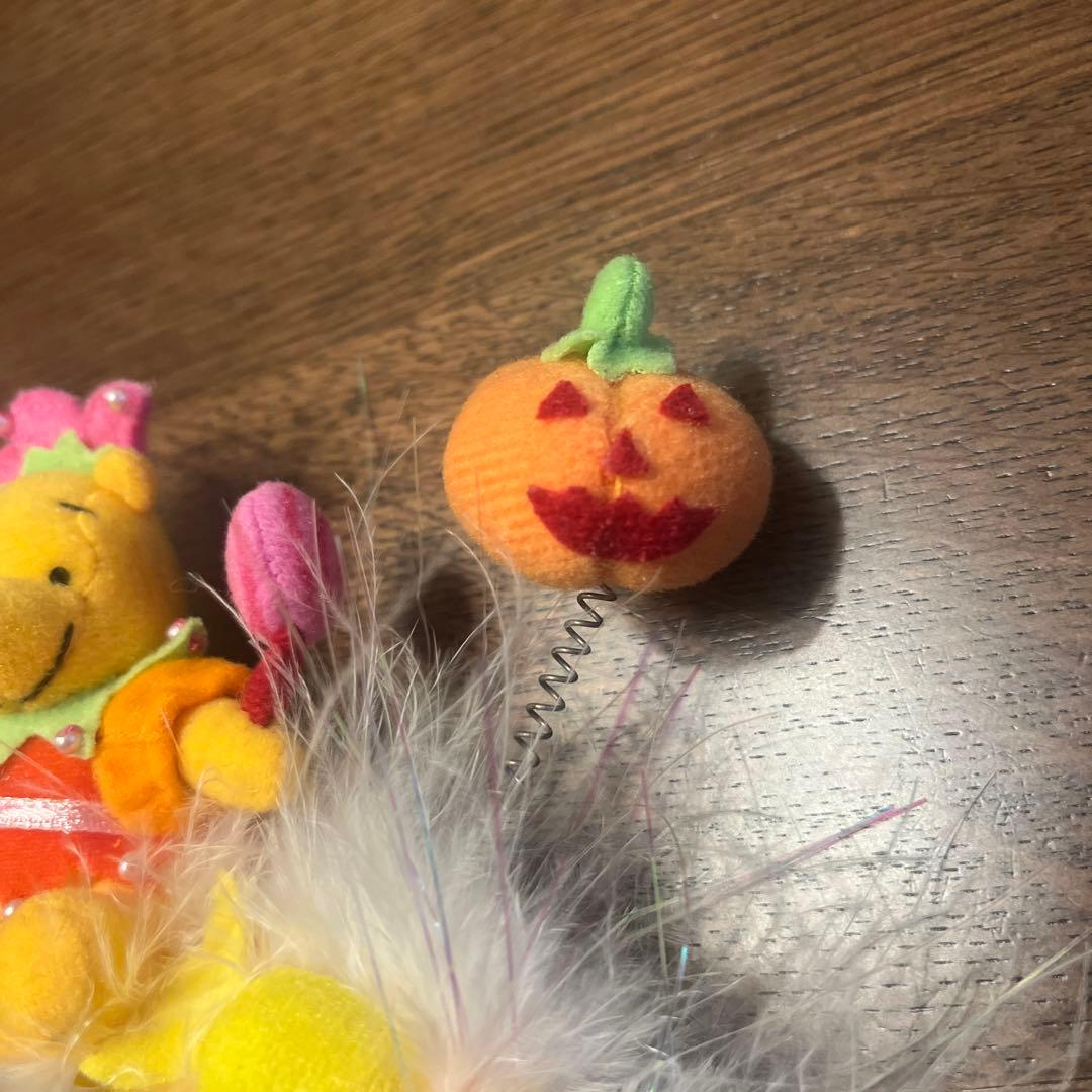 ディズニー　カチューシャ　プーさん　ハロウィン　パンプキン　キャンディ　フェザー