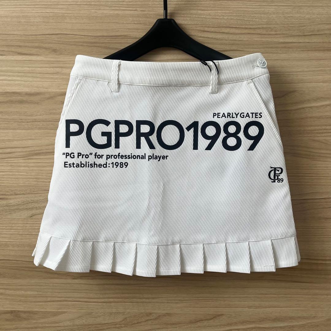 新品★28,600円 パーリーゲイツ 裾プリーツスカート 春夏ホワイトスカート0
