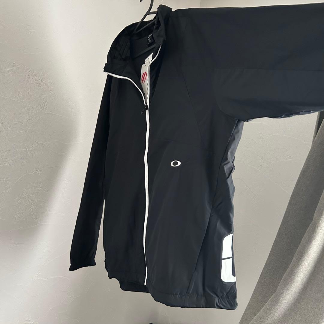 新品オークリー ENHANCE WIND WARM STAND JACKET