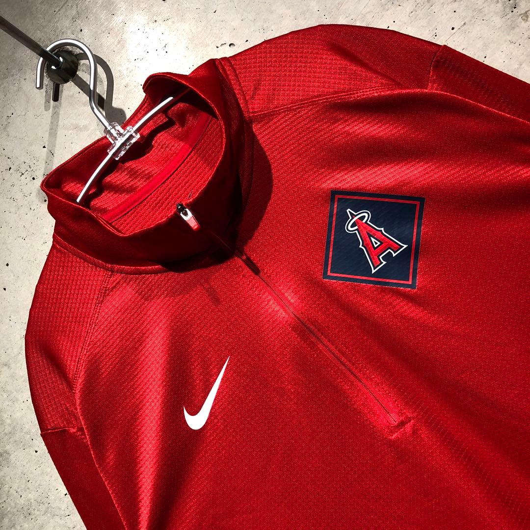 入手困難NIKE MLB エンゼルス ダイアモンドアイコンクォータージップトップ