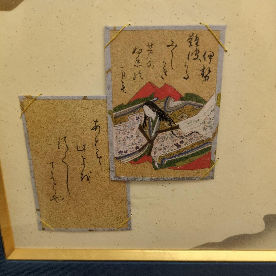百人一首の古いカルタが読札と絵札のセットでマウントされています