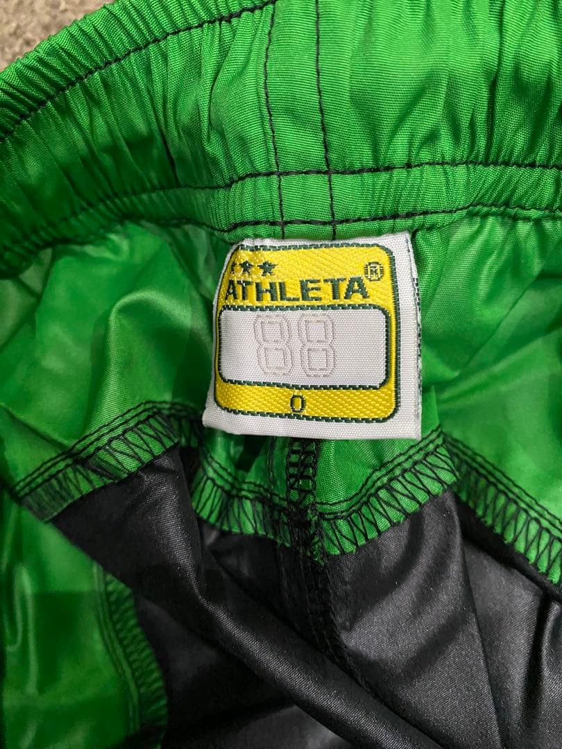 ATHLETA ピステ上下 黒/緑　サイズO