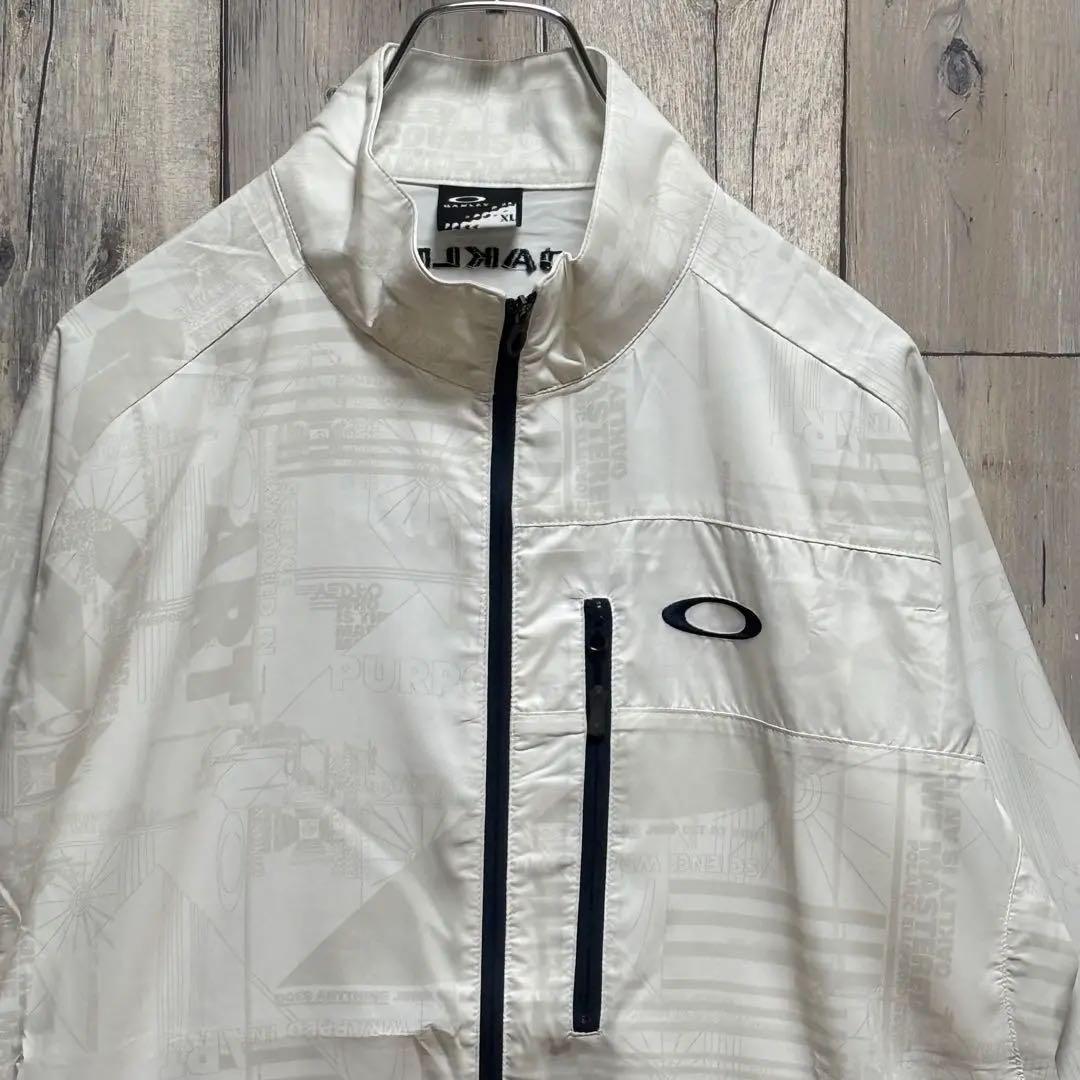 オークリー　OAKLEY ジャケット　ナイロン　総柄　刺繍ロゴ　ホワイト XL