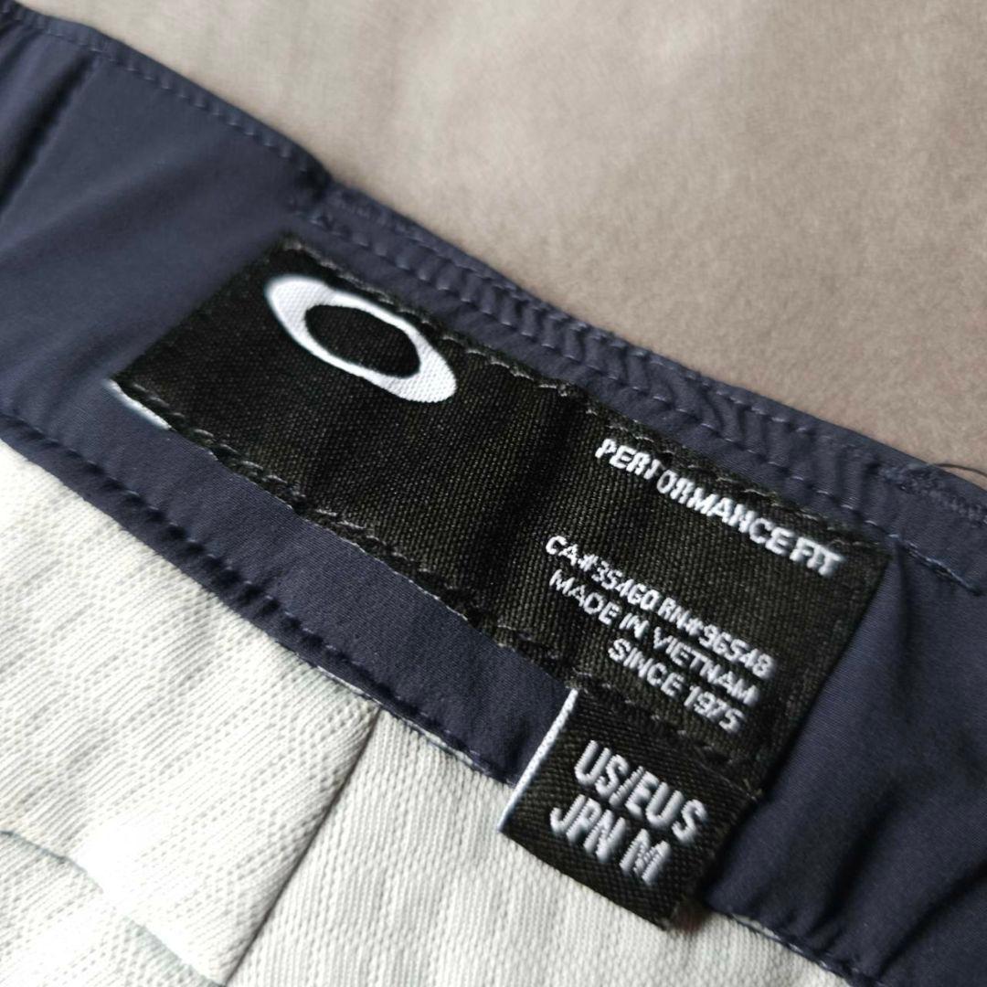 【オークリーゴルフ】蓄熱HEAT×防風 グラフィックデザイン 秋冬ゴルフバンツM