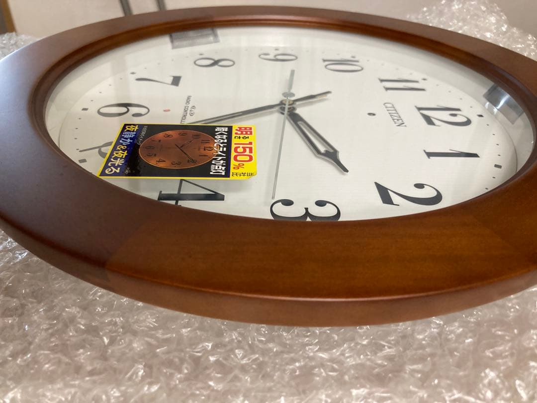 シチズン電波掛時計　木枠　夜光る　明るさ（強/中/弱/消す）16,500円の品