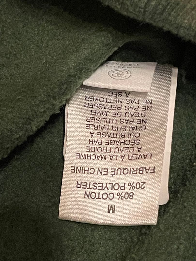 Stussy オリーブ フードスウェット