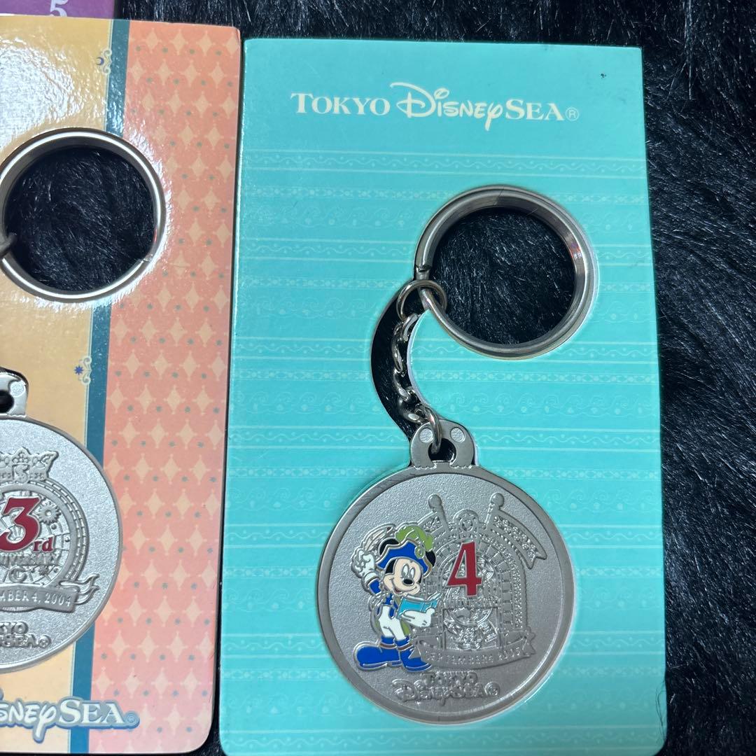 東京ディズニーシー 周年記念メダルキーホルダー 5個セット