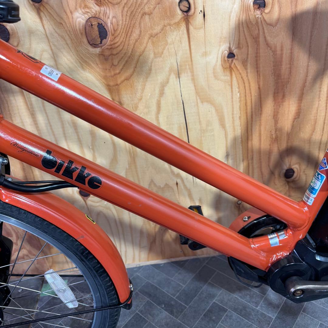 オレンジ色 電動アシスト自転車 シティタイプ
