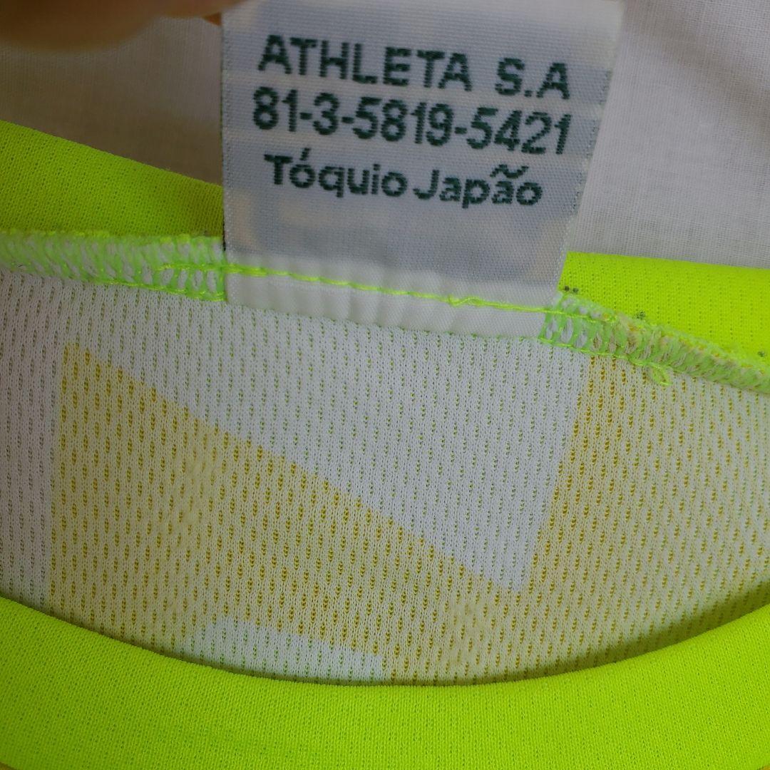 ATHLETA ネオンイエロー 長袖 ウェア ロンT 模様 柄 サッカー