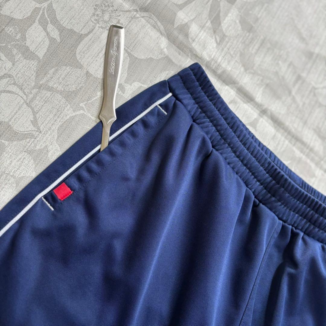 FILA ジャージ下　メンズM（ユニセックス可）　明るいネイビー　ブランドロゴ