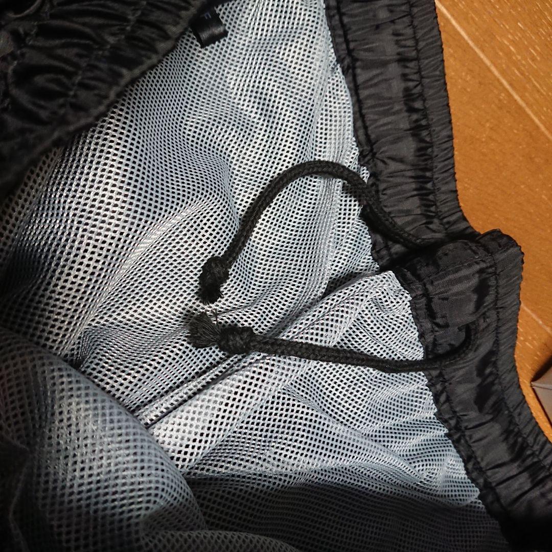 新品　ゼクシオ　ウィンドブレーカー上下収納袋 靴下セット　メンズLL